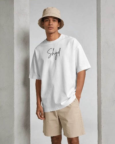 Model wearing a relaxed oversized drop-shoulder t-shirt – SHYD.pk